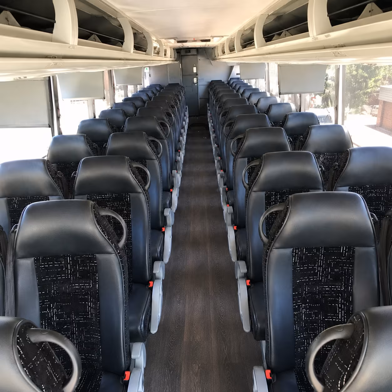 how distance mileage and route complexity affect bus rental costs in syracuse